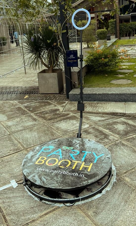 PartyBooth 360 degree photo and video booth platform outdoors with ring light
